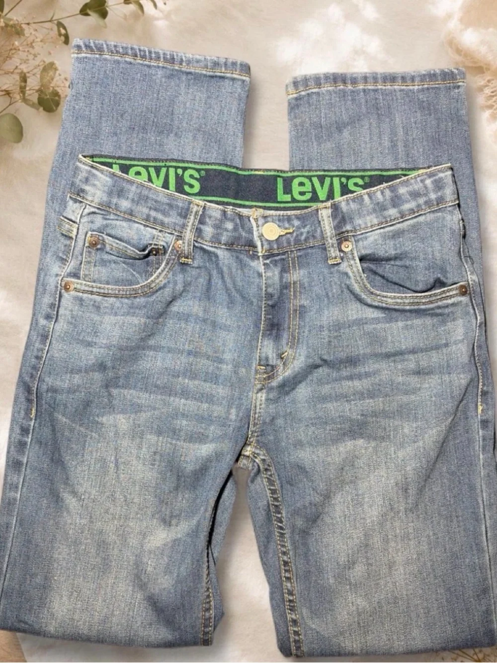 Levi's Men's Light Denim Straight Jeans with Green Waistband Accent